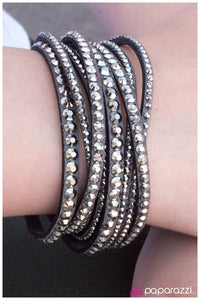 five-dollar-jewelry-wrapped-around-her-finger-silver-bracelet-paparazzi-accessories